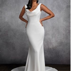 Brand new with Tags, never worn or altered